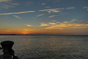 a sunset over a body of water at Towneplace Suites by Marriott Cleveland Westlake in Westlake