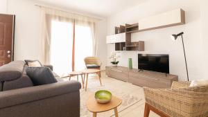 TV a/nebo společenská místnost v ubytování Sardinianworld - Xenia Boutique Tirso