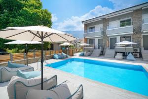 Photo de la galerie de l'établissement Aerino Luxury Villas, à Chrysi Ammoudia