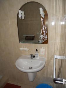 a bathroom with a sink and a mirror at Apartment in Las Americas in Playa de las Americas