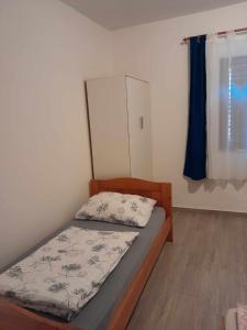 Posteľ alebo postele v izbe v ubytovaní Apartman Salvia