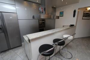 Kuchyň nebo kuchyňský kout v ubytování Apartment Lycia