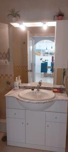 a bathroom counter with a sink and a mirror at Selene in Calpe +56 photos