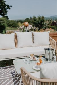 Posezení v ubytování Hôtel Le Romantica