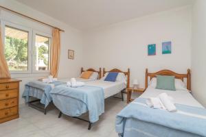 Postel nebo postele na pokoji v ubytování Casa Aina