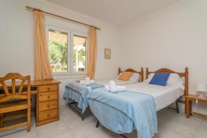 Postel nebo postele na pokoji v ubytování Casa Aina