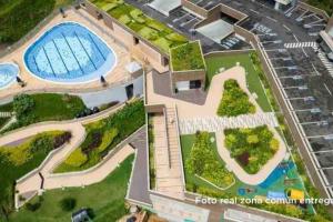 an aerial view of a stadium with a swimming pool at Apartamento amoblado en Sabaneta in Sabaneta