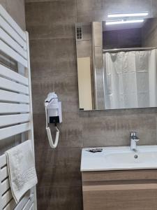 Koupelna v ubytování Hôtel AMBEILLE