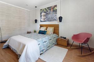 Postel nebo postele na pokoji v ubytování Alojamento Santa Cruz