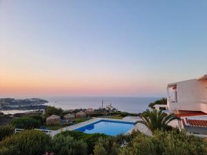 a view of the ocean from a house at Bellevue Village ''Αdults Only'' in Agia Pelagia