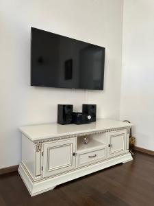Телевизор и/или развлекательный центр в Syros casa