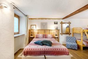 Postel nebo postele na pokoji v ubytování Souvenir au Moulin Aymavilles