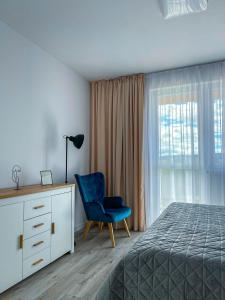 Posteľ alebo postele v izbe v ubytovaní LAWIS Apartments