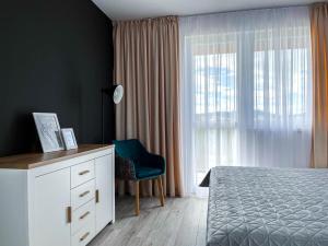 Posteľ alebo postele v izbe v ubytovaní LAWIS Apartments