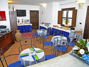 Reštaurácia alebo iné gastronomické zariadenie v ubytovaní Sa Prata Hotel & Resort