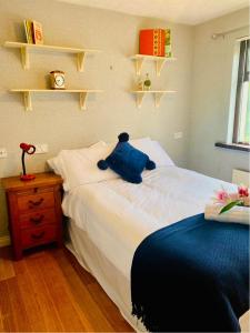 Postel nebo postele na pokoji v ubytování Glenview Cottage