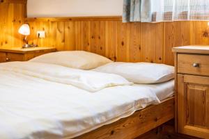 Postel nebo postele na pokoji v ubytování Lindenhof Apt 6