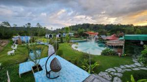 an aerial view of a resort with a swimming pool at ภูอิงนาคาเฟ่&รีสอร์ท in Ban Wang Takhrai
