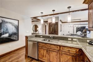 a kitchen with a sink and a counter at Ritz 2Br R614 in Vail