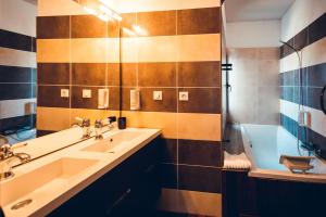 a bathroom with a sink and a shower at Marina D'oro in Macinaggio