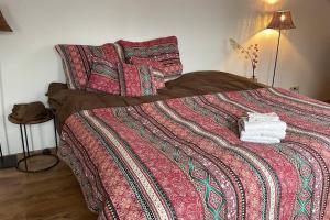 En eller flere senge i et værelse på De Twee Zwanen