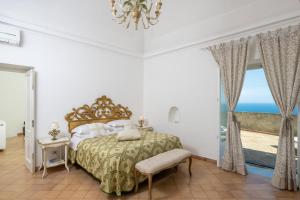 Posteľ alebo postele v izbe v ubytovaní Villa Marilu Praiano