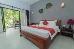 Кровать или кровати в номере New Riverside Hotel +55 фотографий