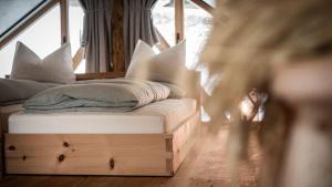 Ένα ή περισσότερα κρεβάτια σε δωμάτιο στο Burgfrieder Mühle