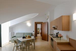 Køkken eller tekøkken på Hotel & Apartments Sasso