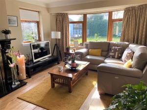 Posezení v ubytování 26 Green Drive Inverness