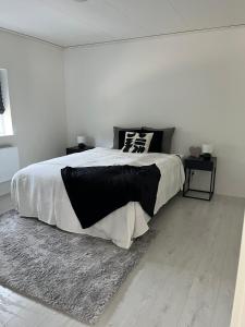 Postel nebo postele na pokoji v ubytování Villa Elme + 23 fotografií