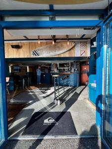 a room with a skateboard on the wall at LOGIS HOTEL - La Petite Rade in Le Havre
