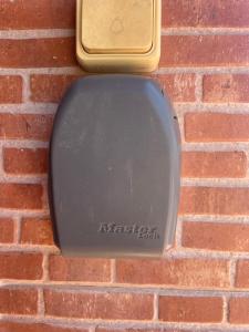 a cell phone is on a brick wall at Malaga Chalet en Guadalmar in Málaga