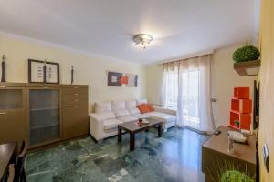 Posezení v ubytování Apartamento Céntrico Sibarys-3 dormitorios