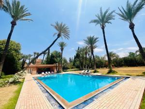 Bazén v ubytování Majestic Luxury Villa Marrakech nebo v jeho okolí + 5 fotografií