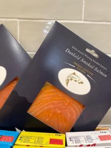 a box with a picture of a piece of salmon at Tay House in Dunkeld