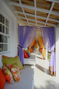 Ένα ή περισσότερα κρεβάτια σε δωμάτιο στο Pousada Bucaneiro