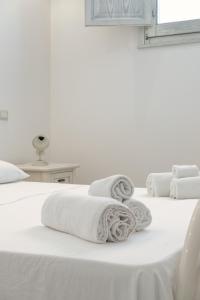 Ένα ή περισσότερα κρεβάτια σε δωμάτιο στο Case del Pescatore