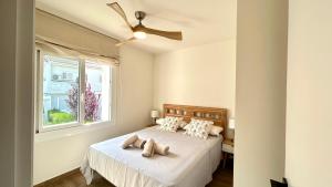 Posteľ alebo postele v izbe v ubytovaní Casa con Jardín y Piscina Comunitaria + 19 fotografií
