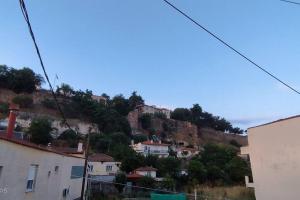 a town on a hill with houses on it at Δ2 in Dhidhimótikhon