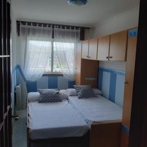 Postel nebo postele na pokoji v ubytování Apartamento Atico Altar