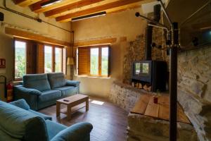 TV a/nebo společenská místnost v ubytování Casa Barambán