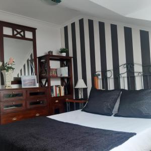 Postel nebo postele na pokoji v ubytování Apartamento Atico Altar