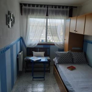 Postel nebo postele na pokoji v ubytování Apartamento Atico Altar