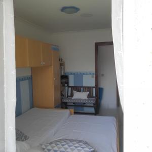 Postel nebo postele na pokoji v ubytování Apartamento Atico Altar