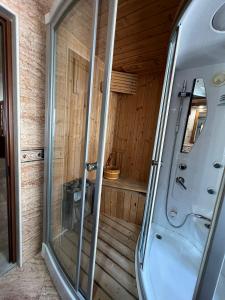 an inside view of an rv with a glass door at Green Garden Villa in Durrës +116 photos