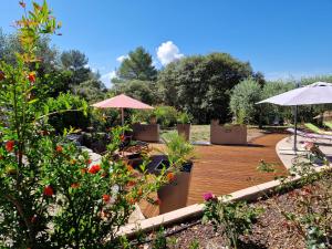 Zahrada ubytování Le Petit Coin de Paradis