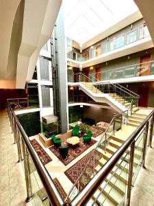 A seating area at The LODGE Hotel Még 37 kép