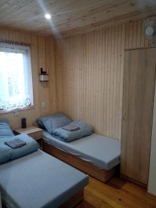 Postel nebo postele na pokoji v ubytování NOCLEGI KAMEX dom 10-osobowy