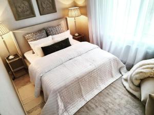 Postel nebo postele na pokoji v ubytování VB Domum Hospitum